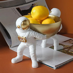 Astronaut Fruit Bowl: Figurine Of Two Astronauts Carrying a Bowl