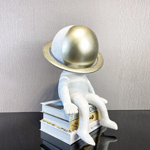 Sitting Spaceman: Decorative Astronaut Figurine For Home